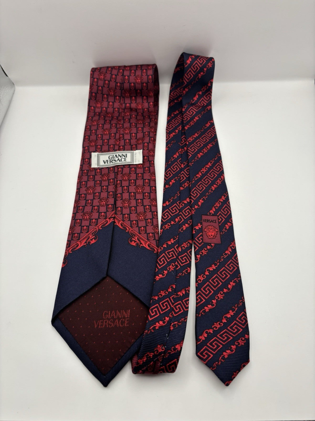 Gianni Versace Men's Slim Silk Tie with a Baroque Medusa Pattern in blue and red