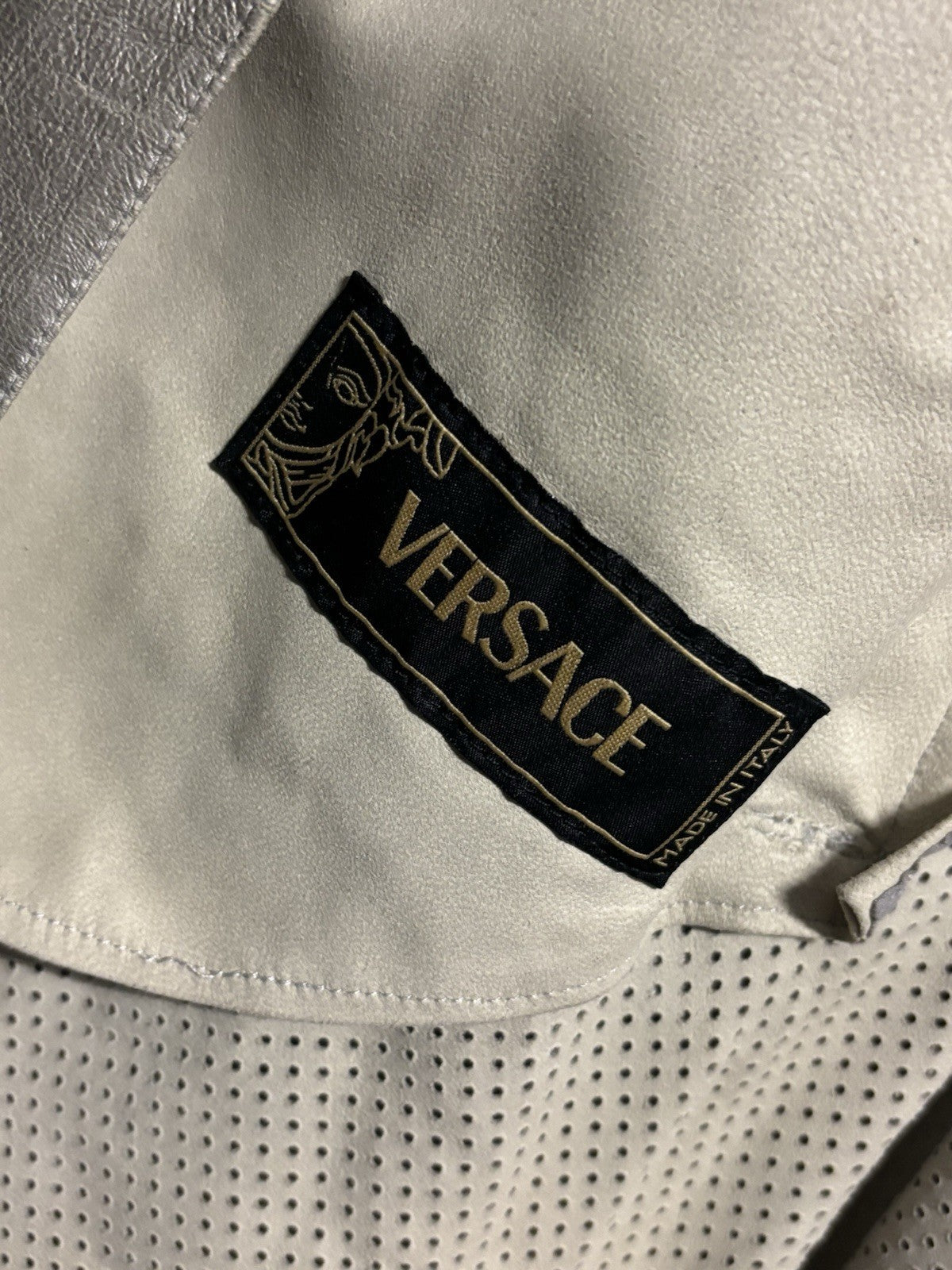 Versace Women silver metallic perforated leather jacket Size S