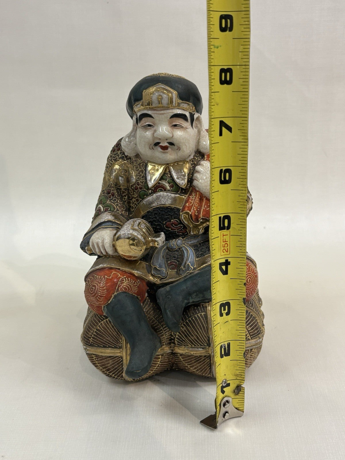 Kutani ware porcelain figurine of Daikokuten, the god of wealth and fortune