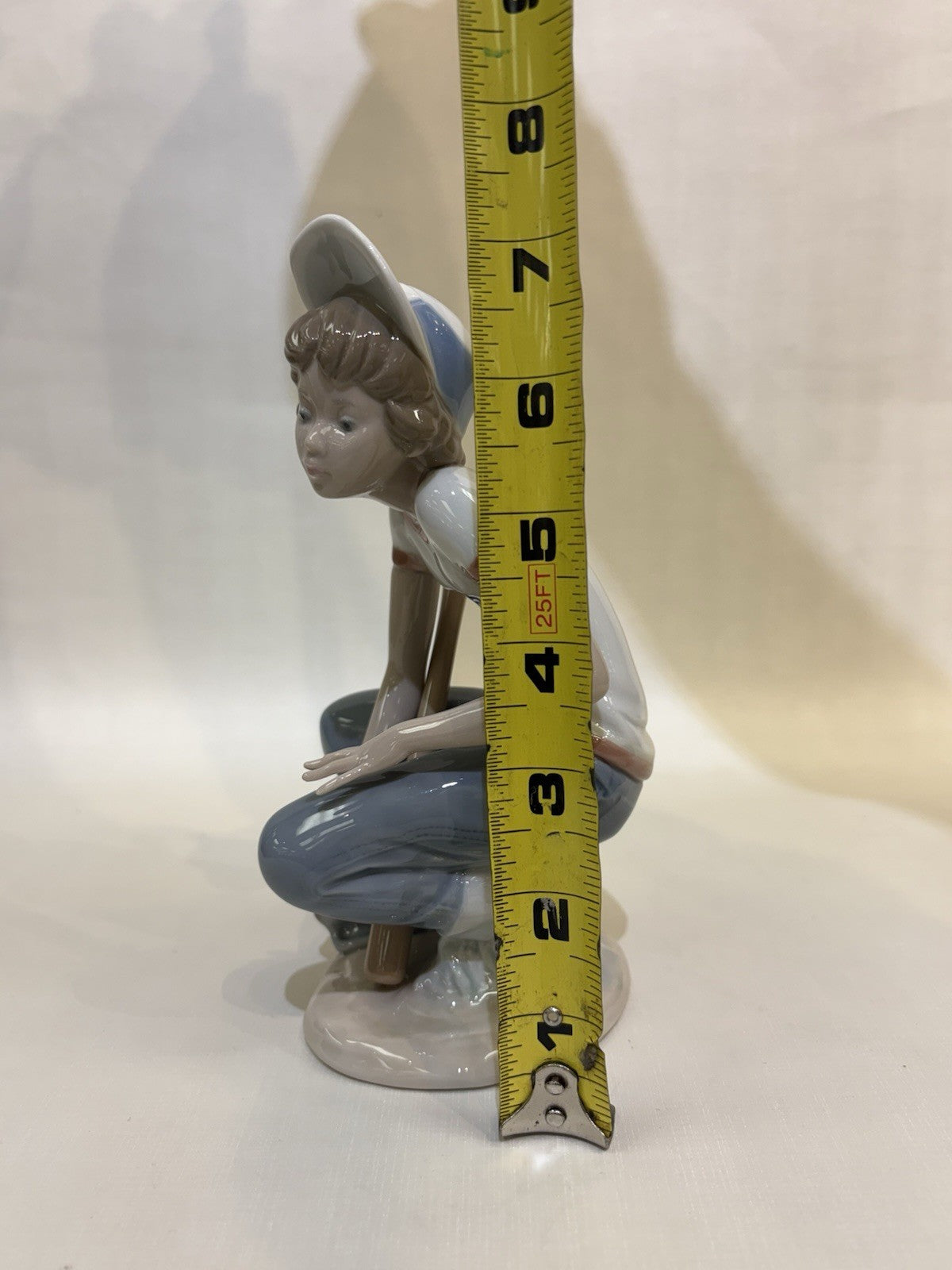 Lladro "Little Leaguer Catcher" porcelain figurine, model number 5290