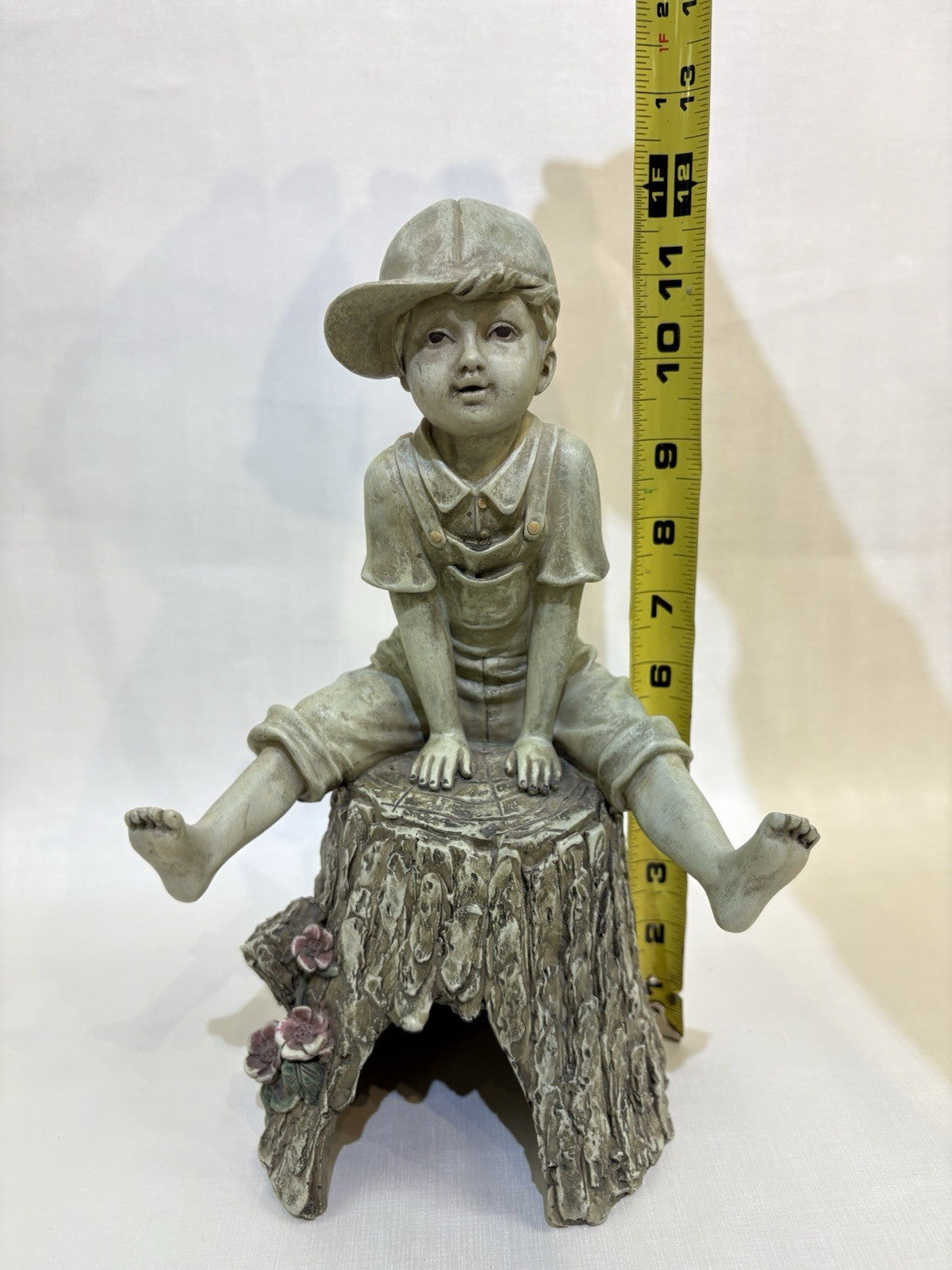 Collectible Statue of A Boy Sitting On A Tree Stump Resin Designed Figurine