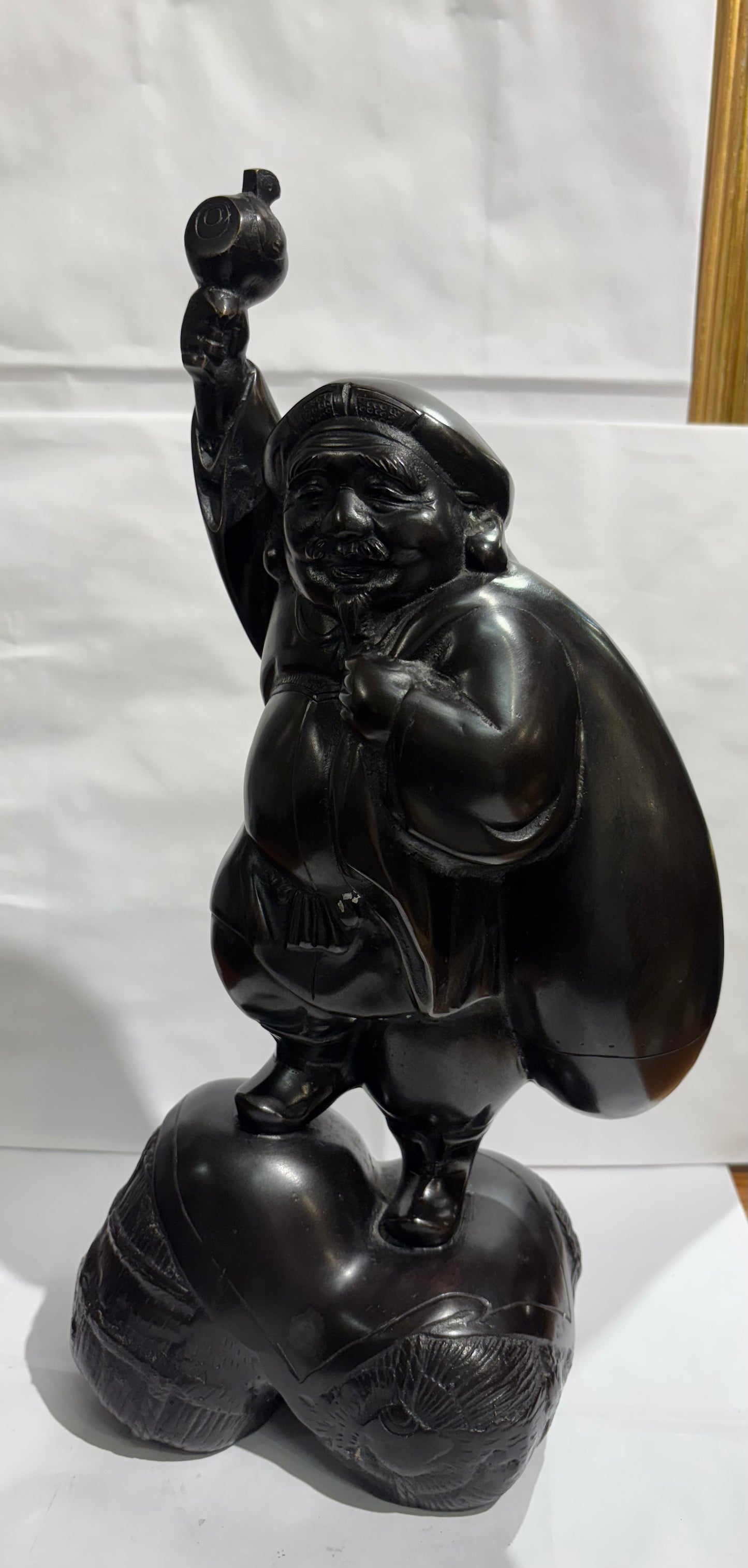 Japanese Meiji Period Bronze sculpture of Daikeko. Height: 15 inch