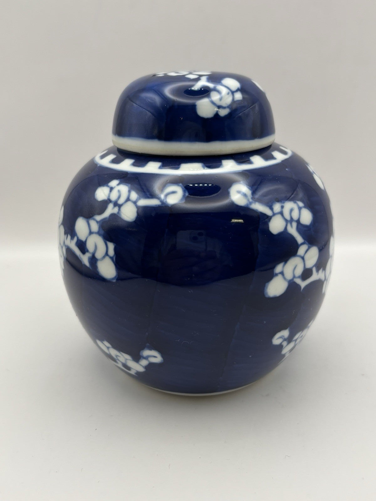 Chinese ginger jar is a blue and white porcelain piece hand-painted design.