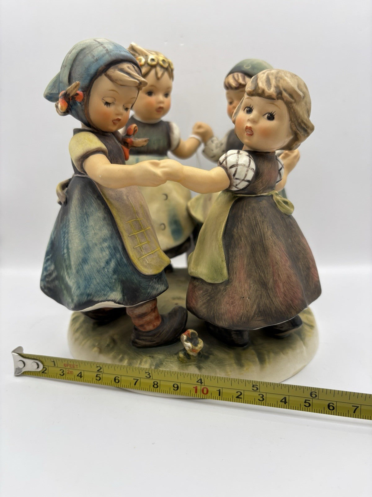 Goebel Hummel "Ring Around The Rosie" figurine, numbered 348