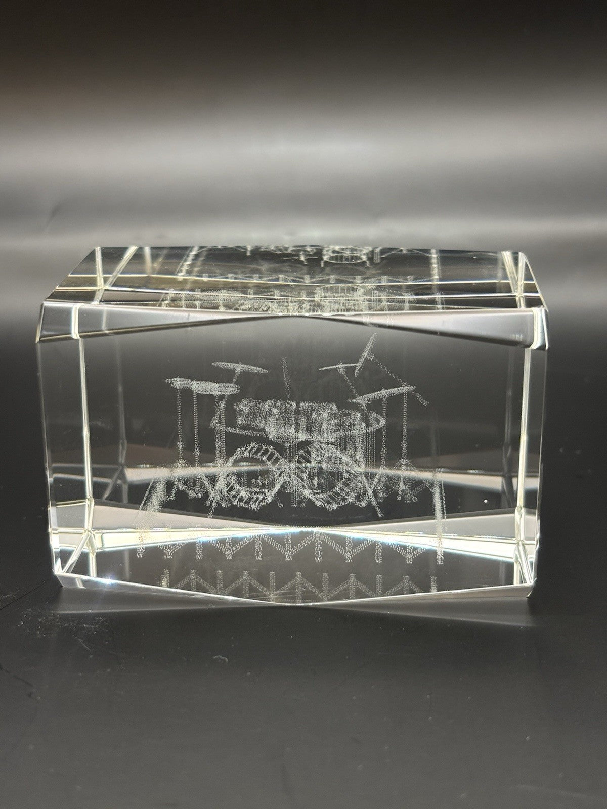 3D laser-etched crystal block paperweight featuring a drum set design