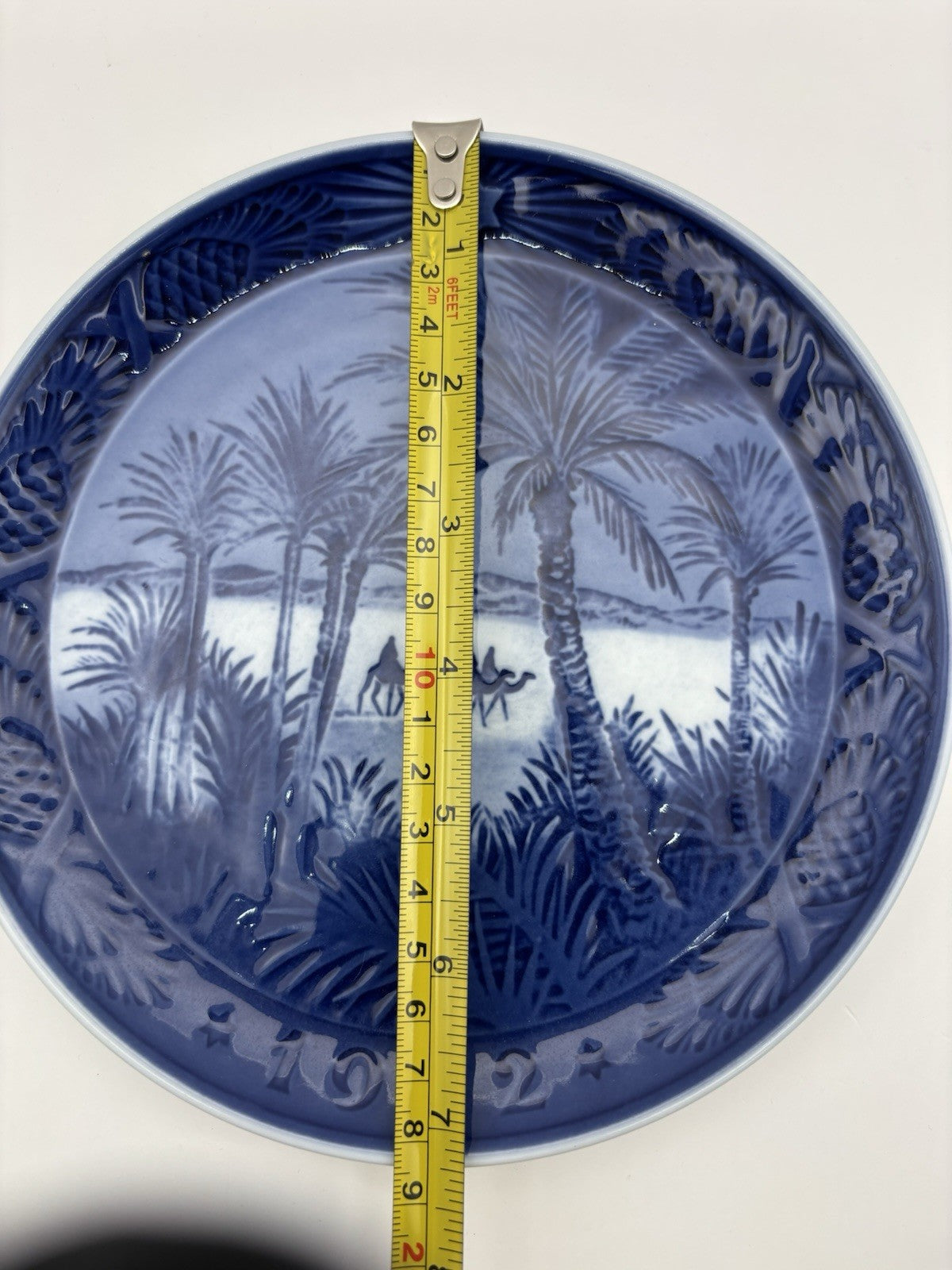 Royal Copenhagen plate 1972, In the Desert,  blue relief scene of camels walking