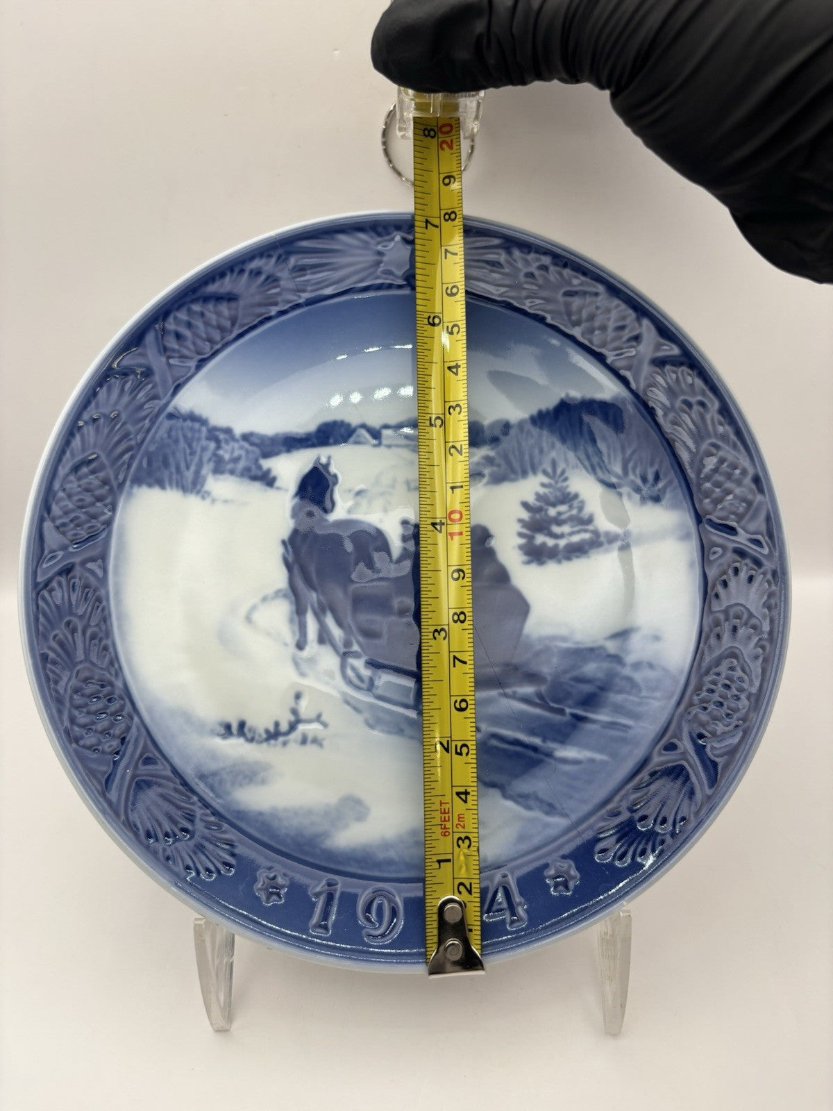1964 Royal Copenhagen porcelain plate horse-drawn sleigh in a snowy landscape.