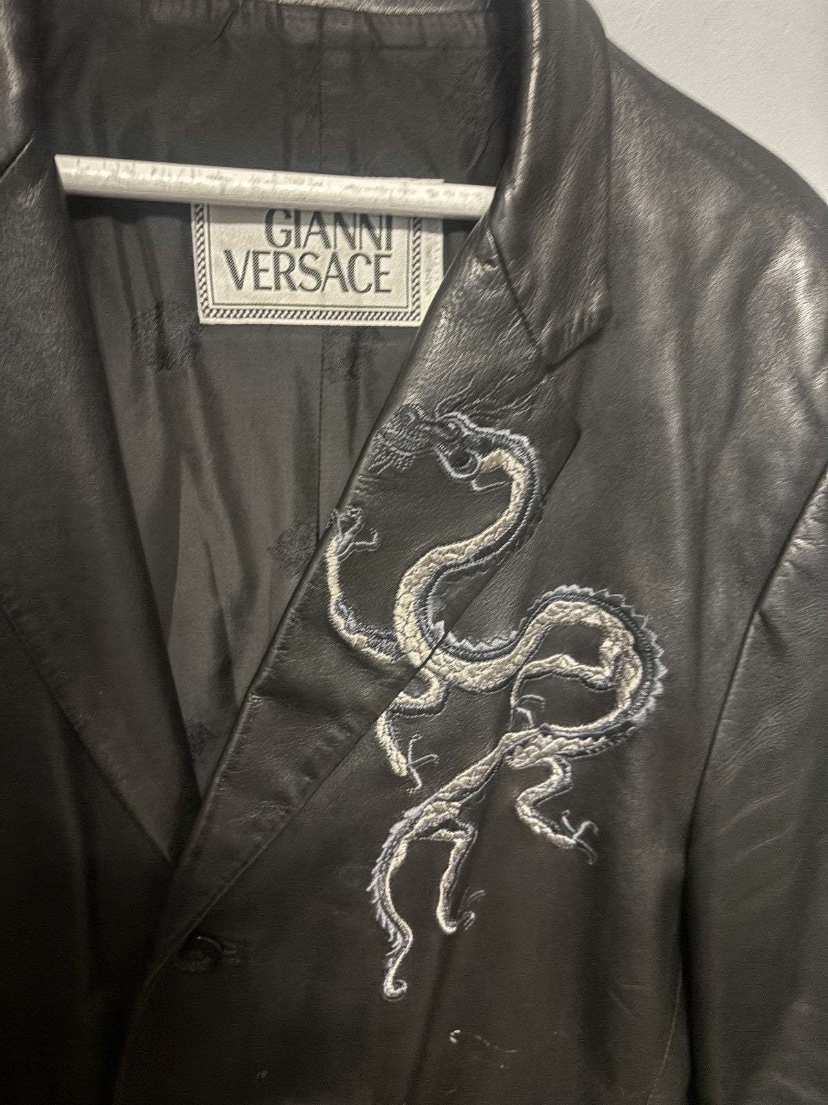VG black leather blazer jacket attributed to the designer Gianni Versace. Size L