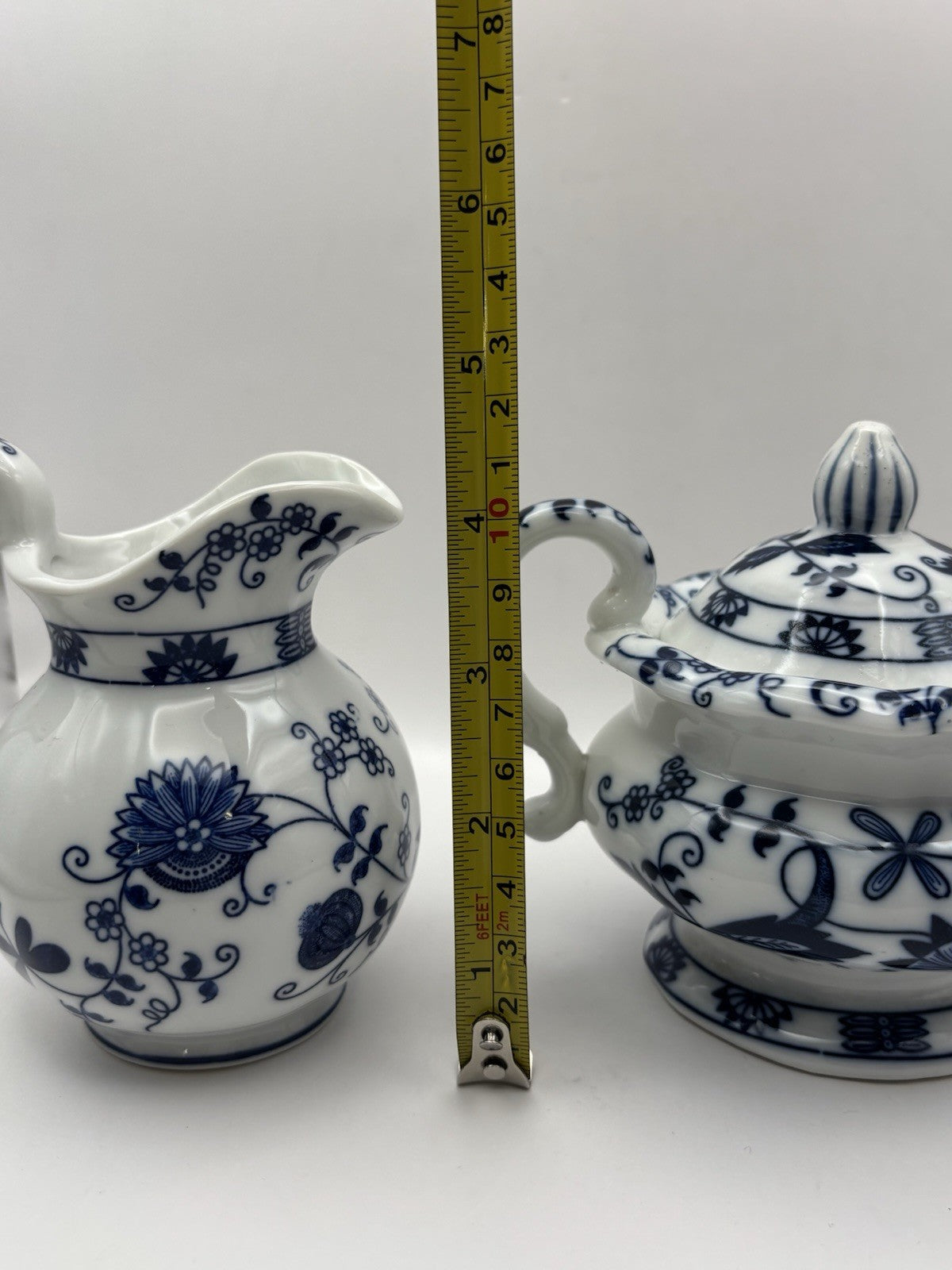 Vienna Woods Fine China In The Iconic Blue Onion Pattern Tea Cup and Saucer Set