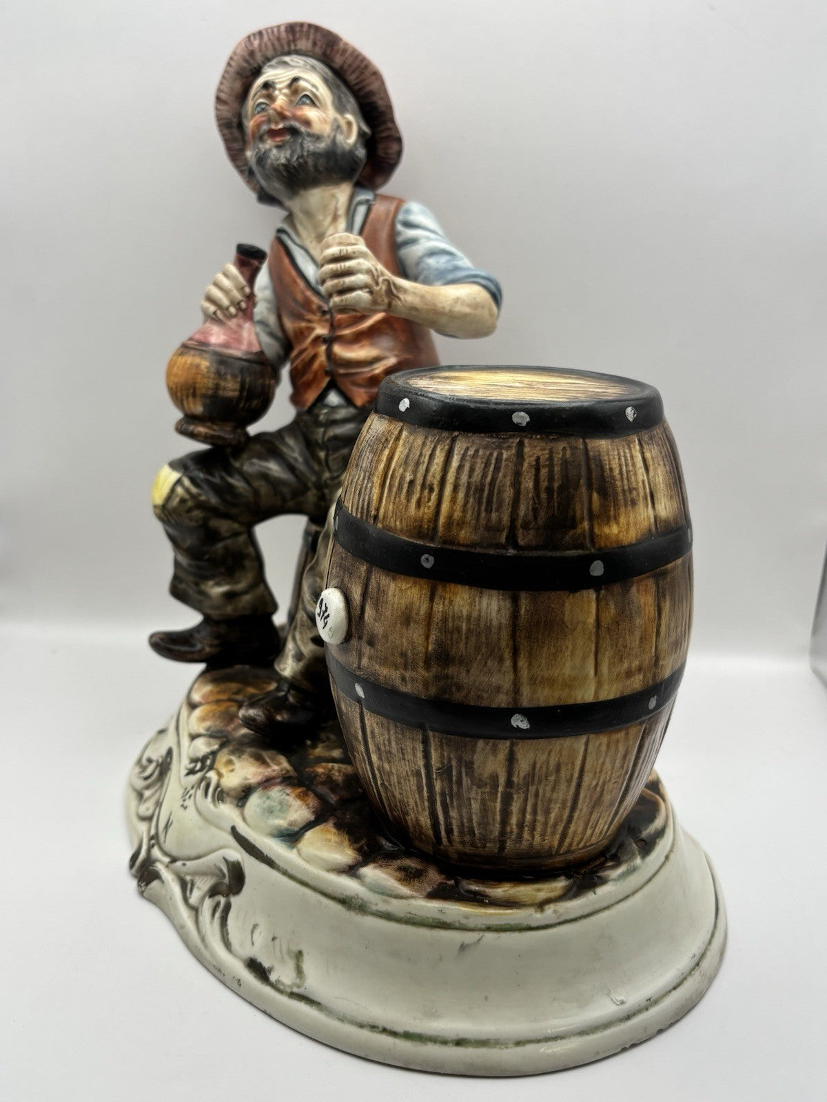 Vintage Capodimonte Hobo Tramp 10" Figurine Holding Jug W/Whiskey Barrels Italy