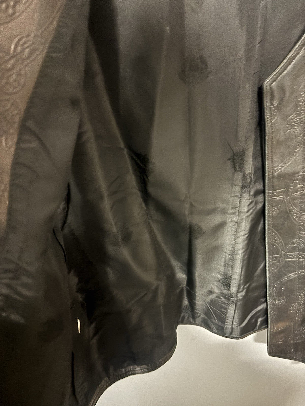 Versace black leather vest with an embossed pattern. Size not know