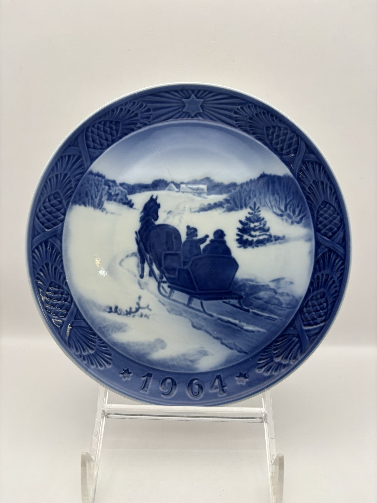 1964 Royal Copenhagen porcelain plate horse-drawn sleigh in a snowy landscape.