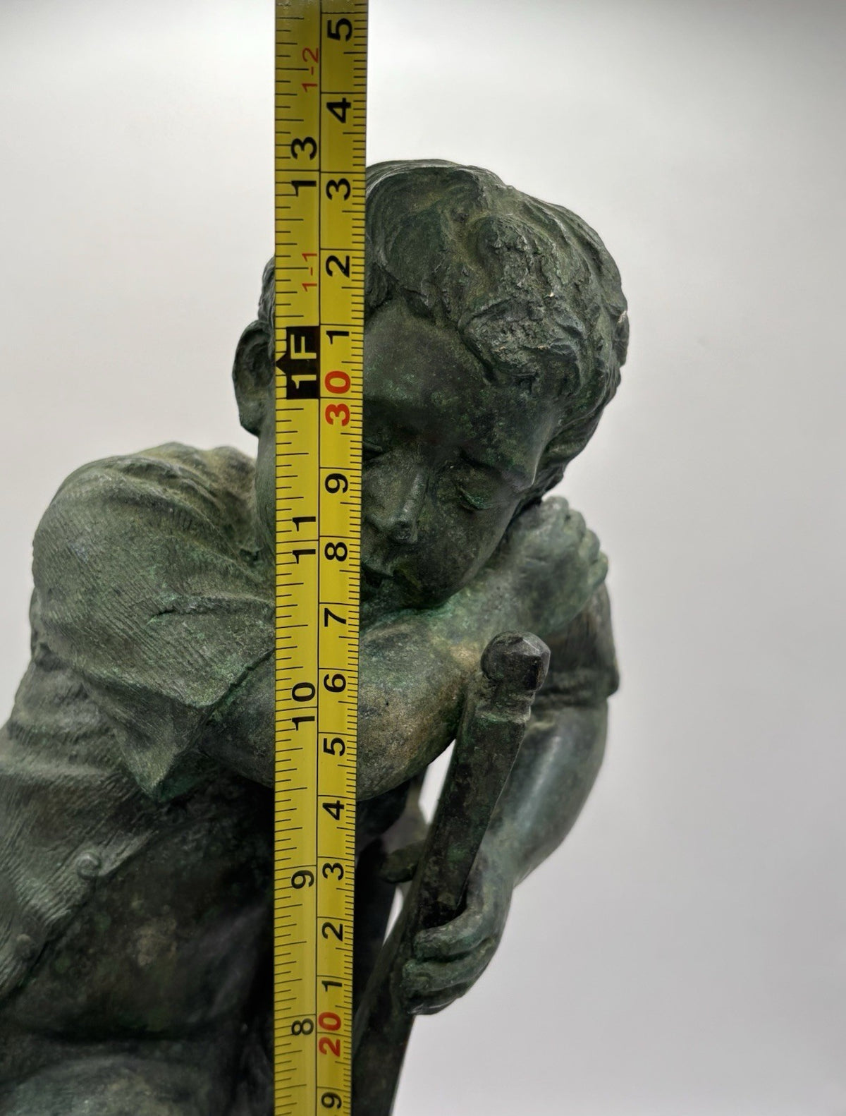Maitland-Smith bronze boy in a chair, distinctive verde finish and brown patina.