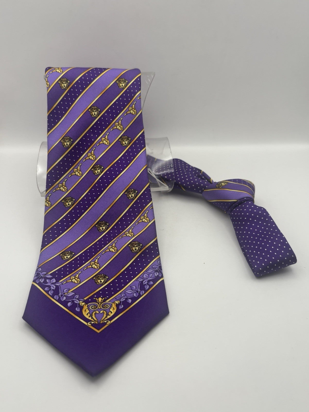 Gianni Versace silk tie purple and gold stripes with a Medusa head motif.