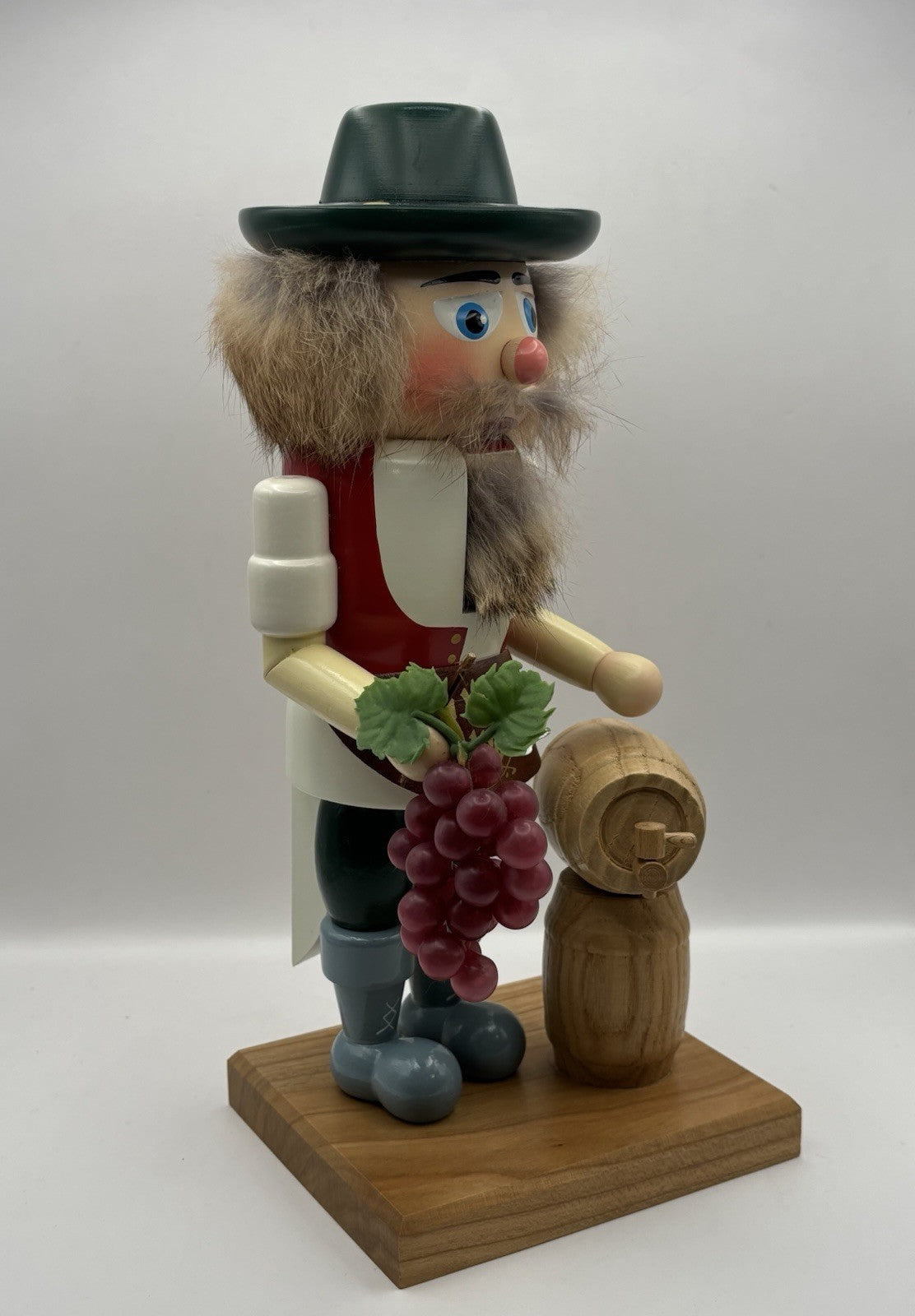 Vintage 11-inch Erzgebirgische Volkskunst winemaker nutcracker from Germany.