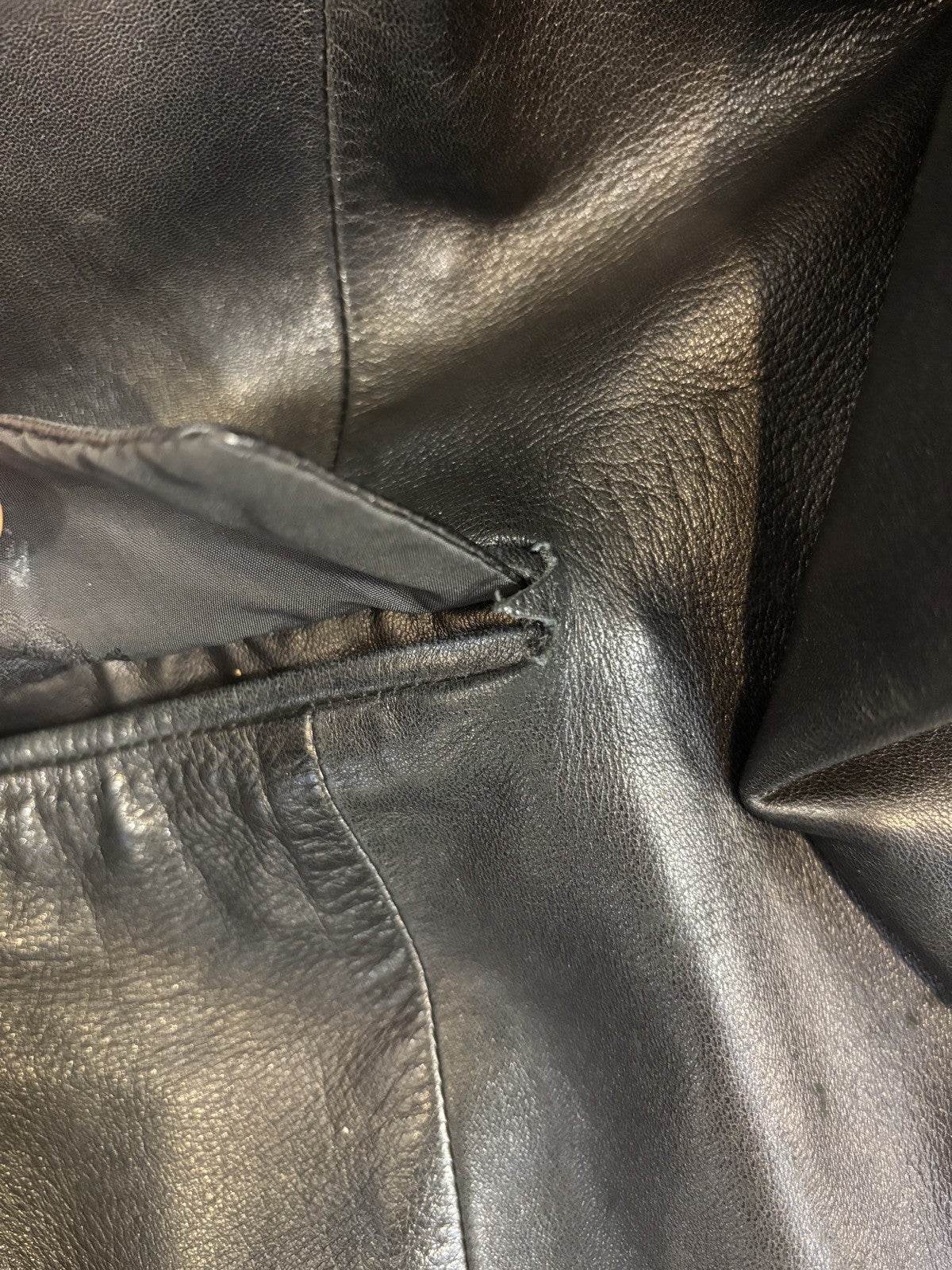 VG black leather blazer jacket attributed to the designer Gianni Versace. Size L