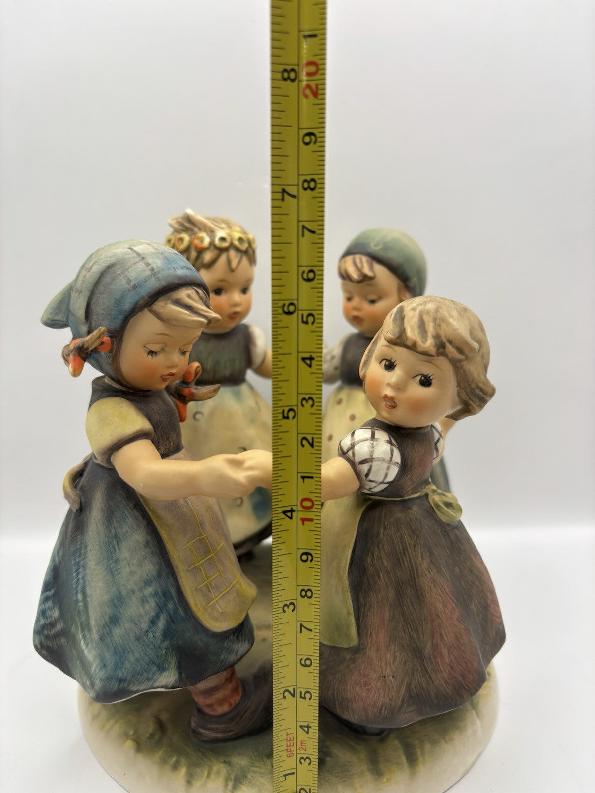 Goebel Hummel "Ring Around The Rosie" figurine, numbered 348