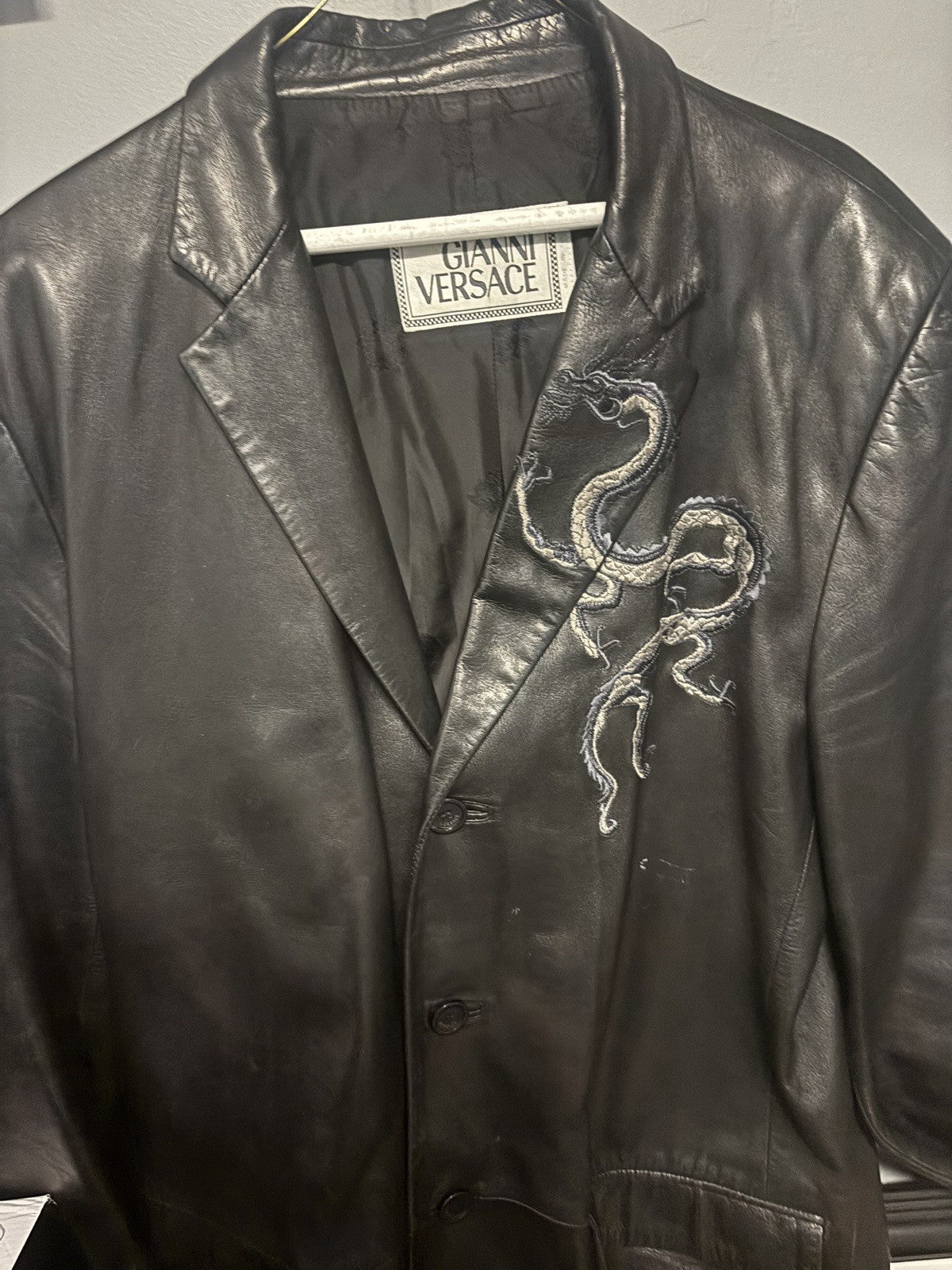 VG black leather blazer jacket attributed to the designer Gianni Versace. Size L
