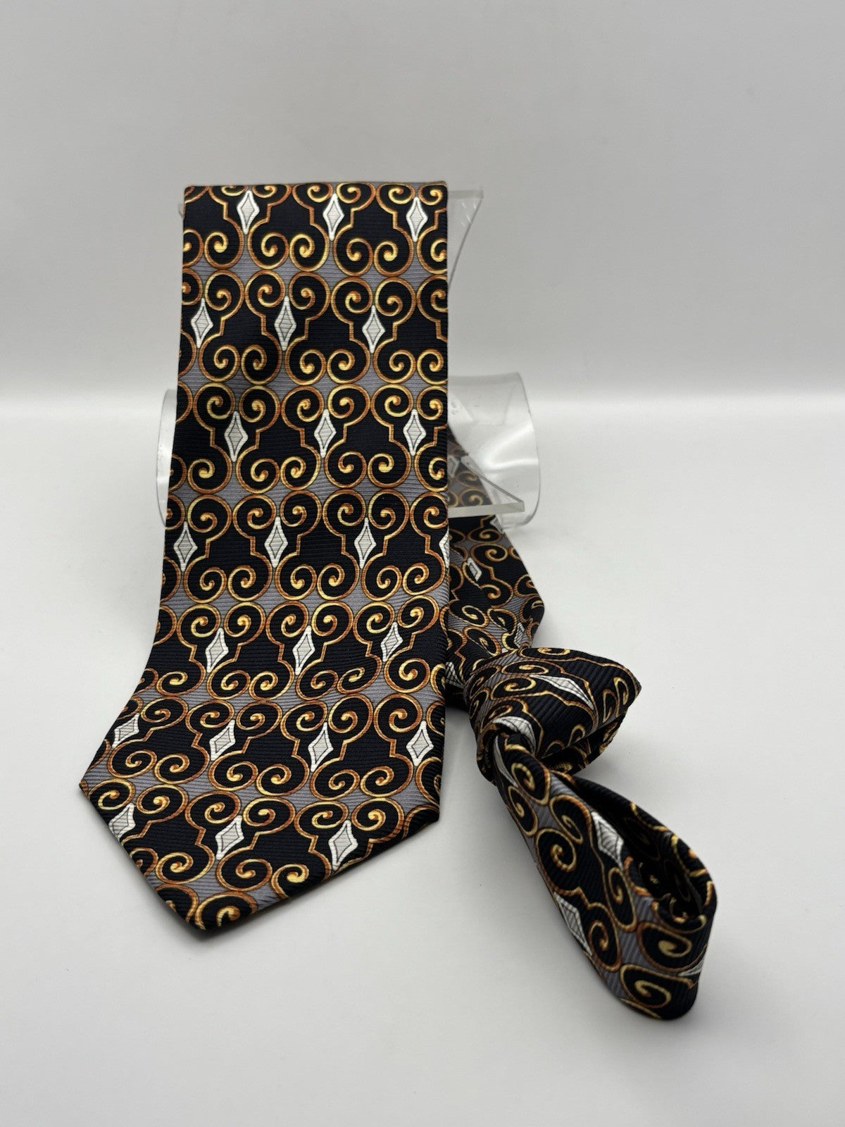 Versace Tie With A geometric scroll pattern in gold and black with white accents
