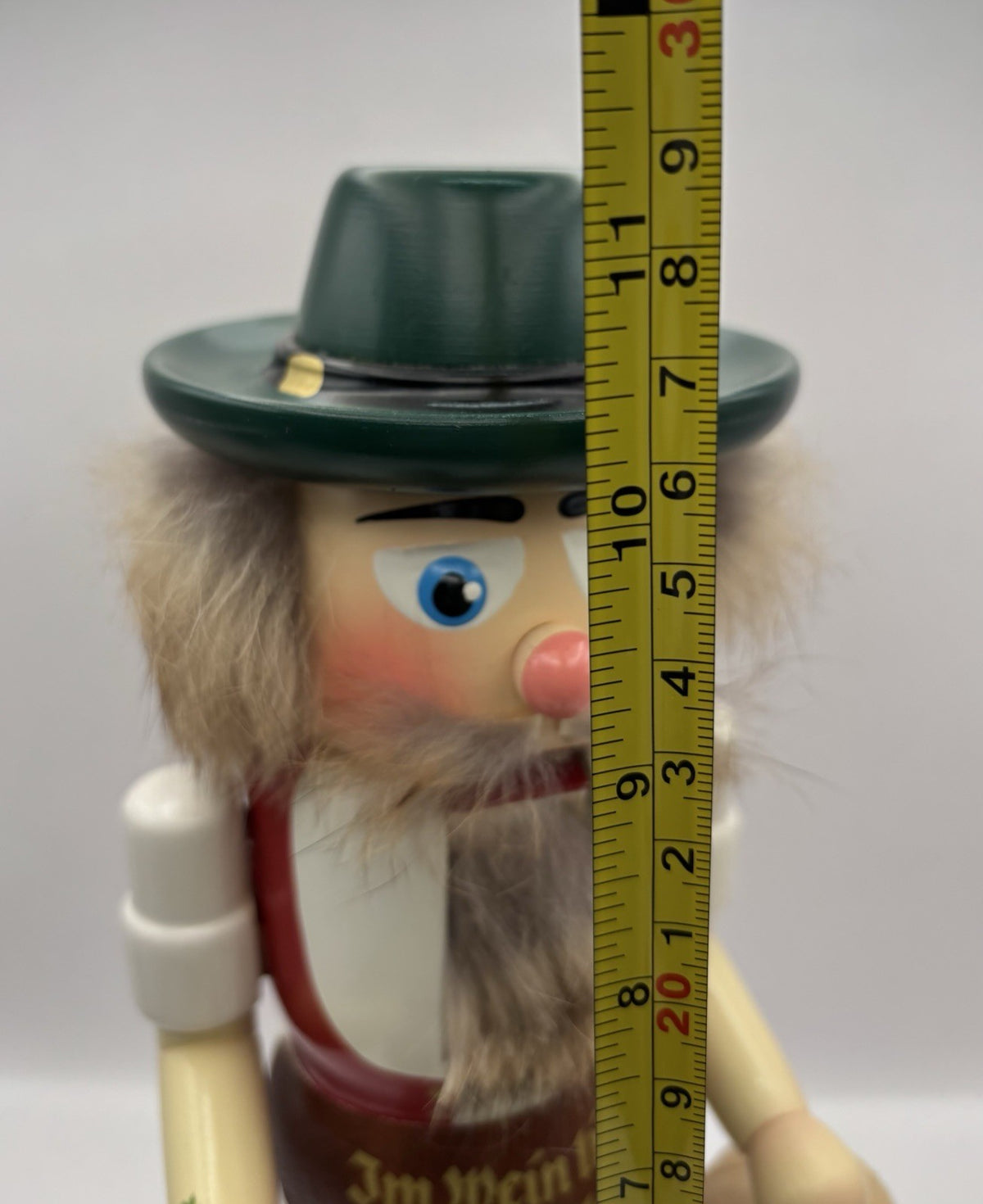 Vintage 11-inch Erzgebirgische Volkskunst winemaker nutcracker from Germany.