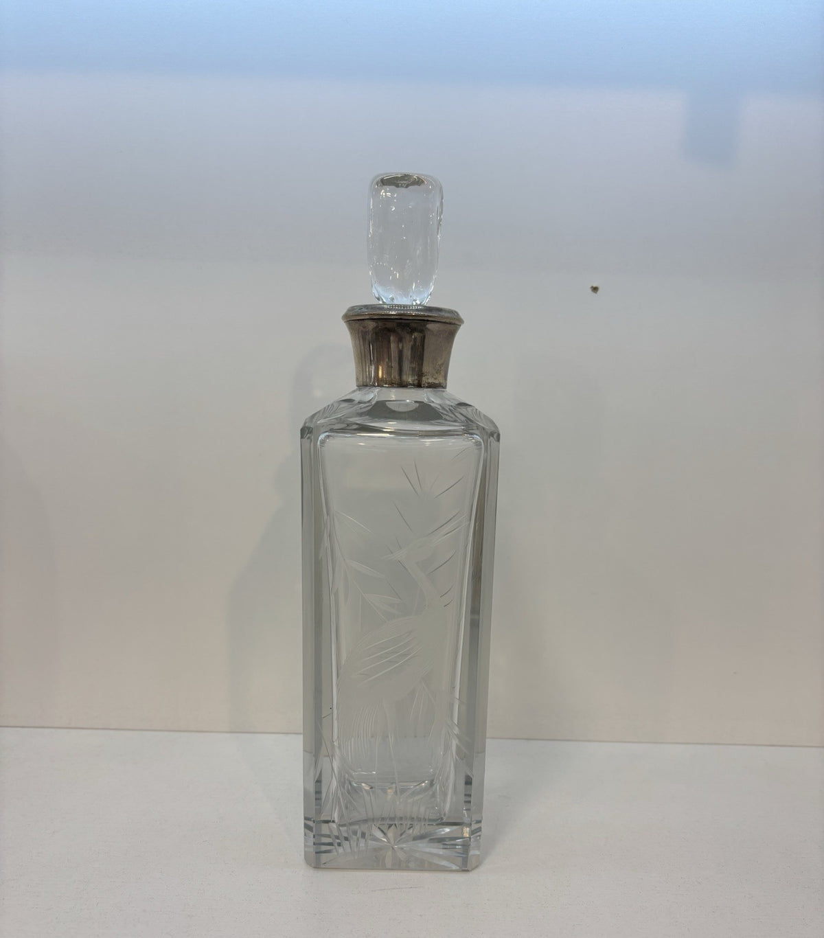 Magnificent cut crystal decanter w a sterlingsilver ram 10.7”