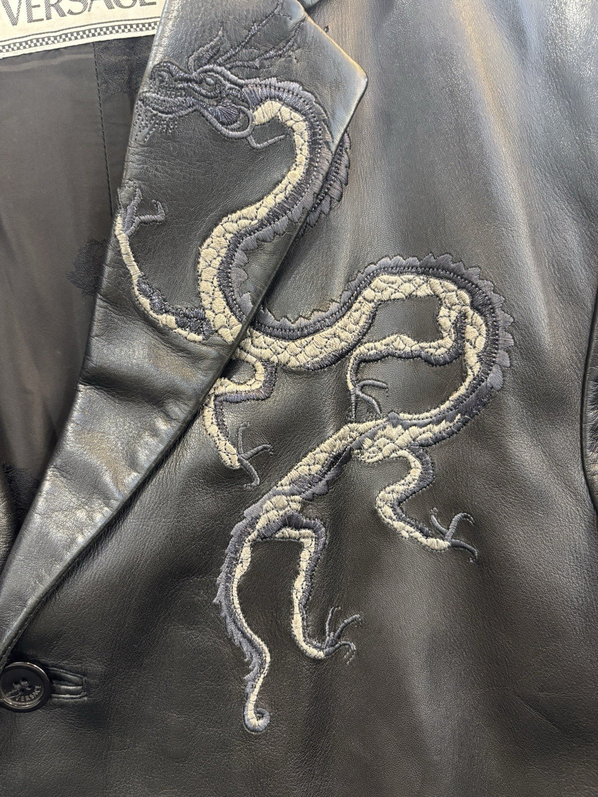 VG black leather blazer jacket attributed to the designer Gianni Versace. Size L