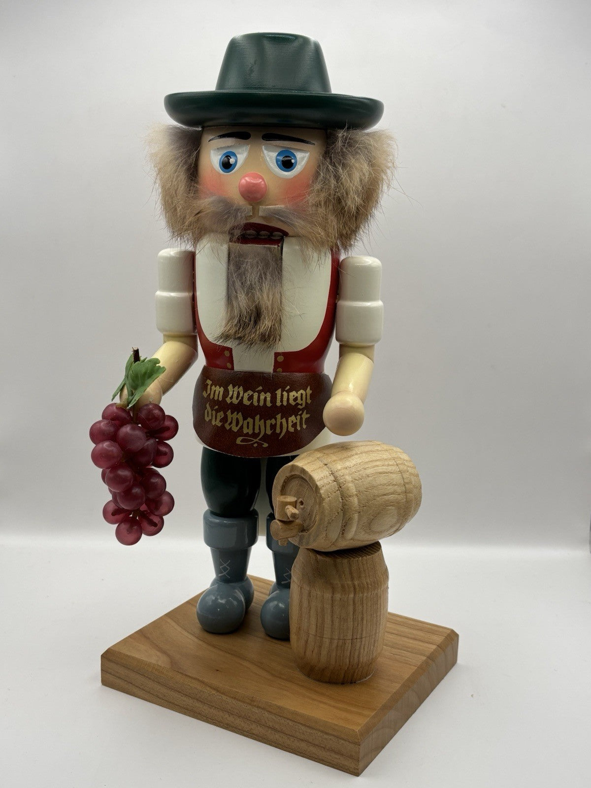 Vintage 11-inch Erzgebirgische Volkskunst winemaker nutcracker from Germany.