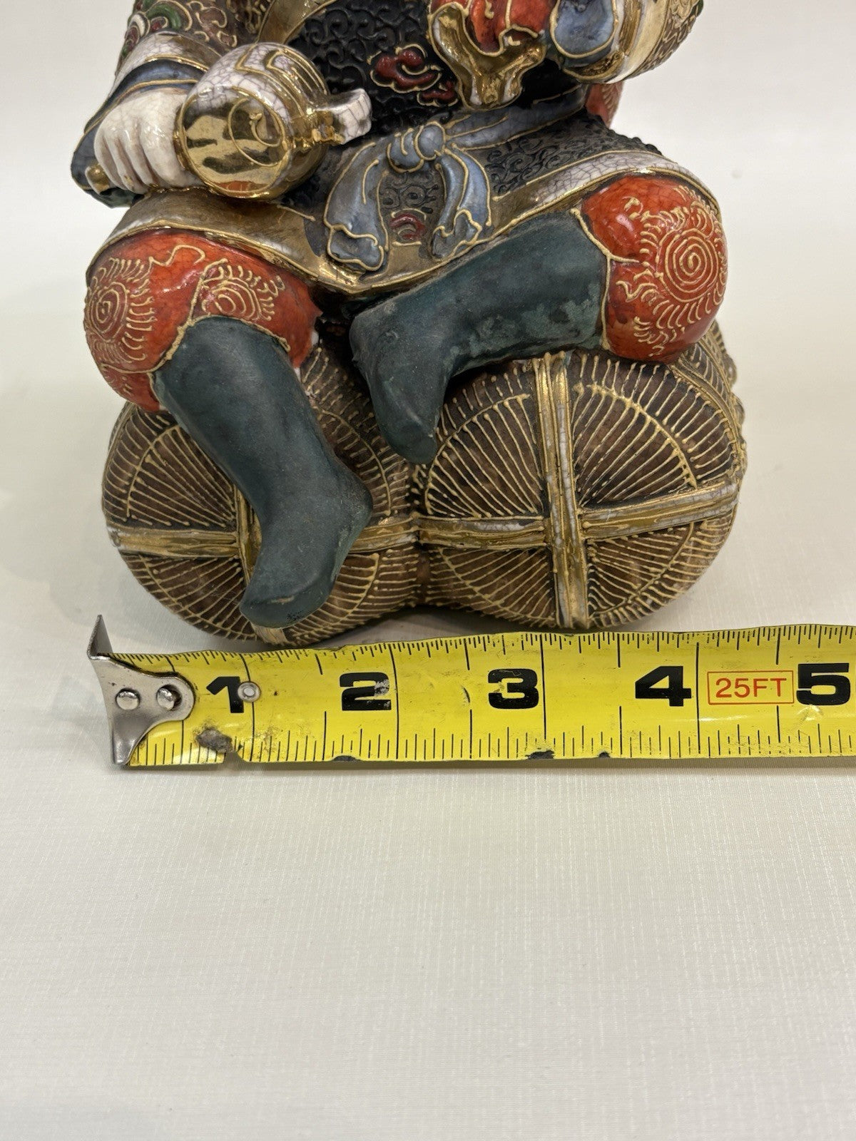 Kutani ware porcelain figurine of Daikokuten, the god of wealth and fortune