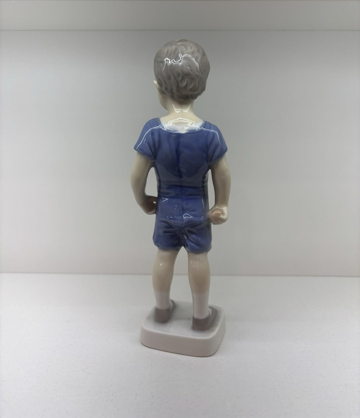 B&G bling and grondahl Copenhagen Denmark boy hiding ball figurine 7” tall