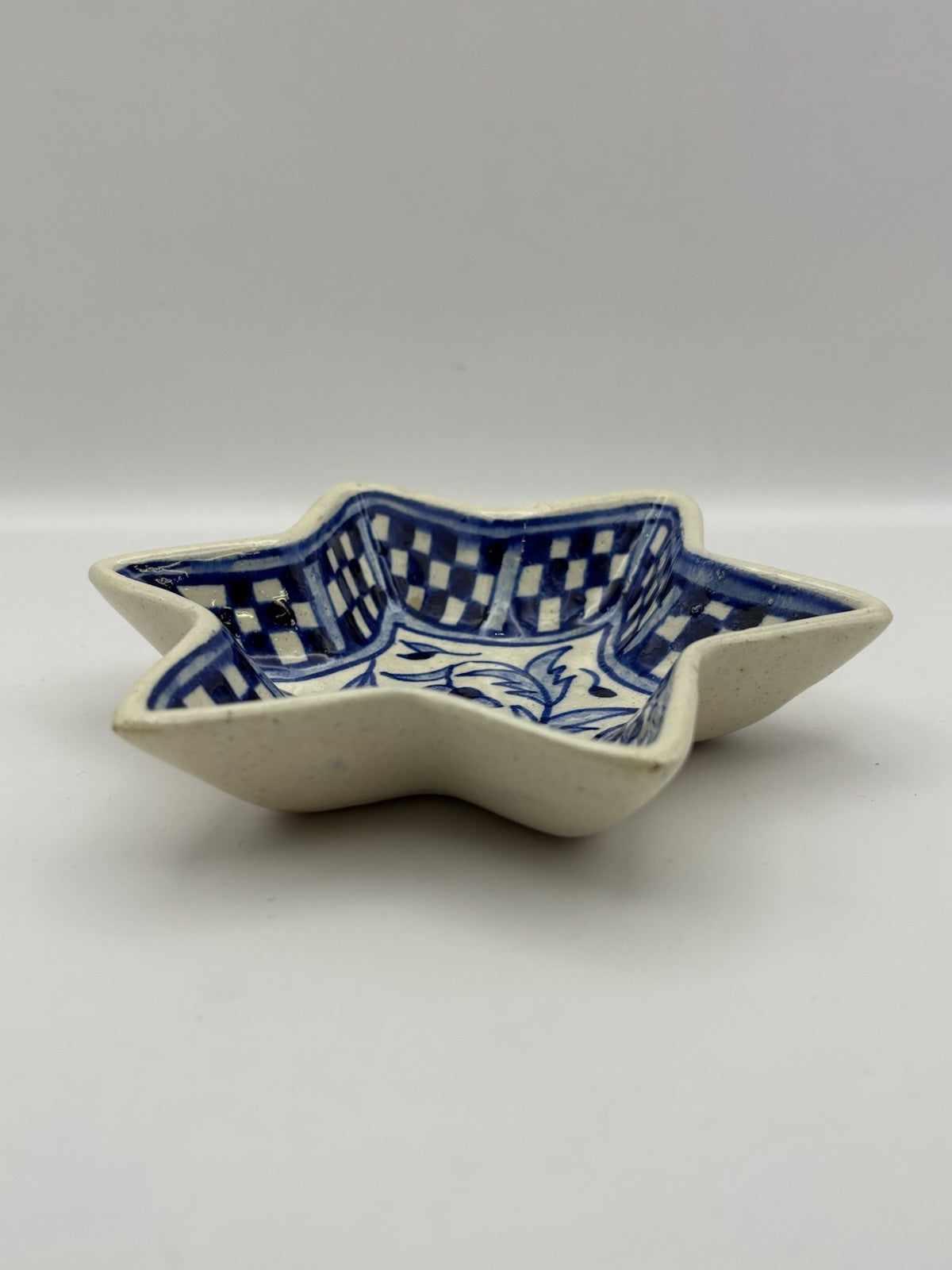 vintage, hand-painted ceramic dish likely crafted in Kütahya, Turkey.