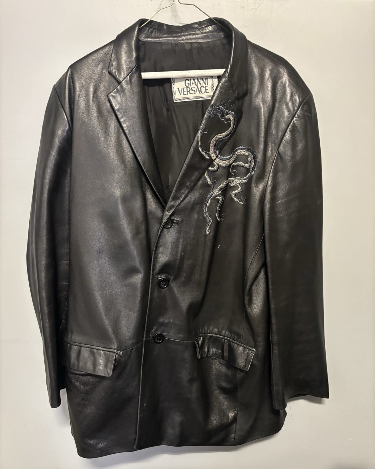VG black leather blazer jacket attributed to the designer Gianni Versace. Size L