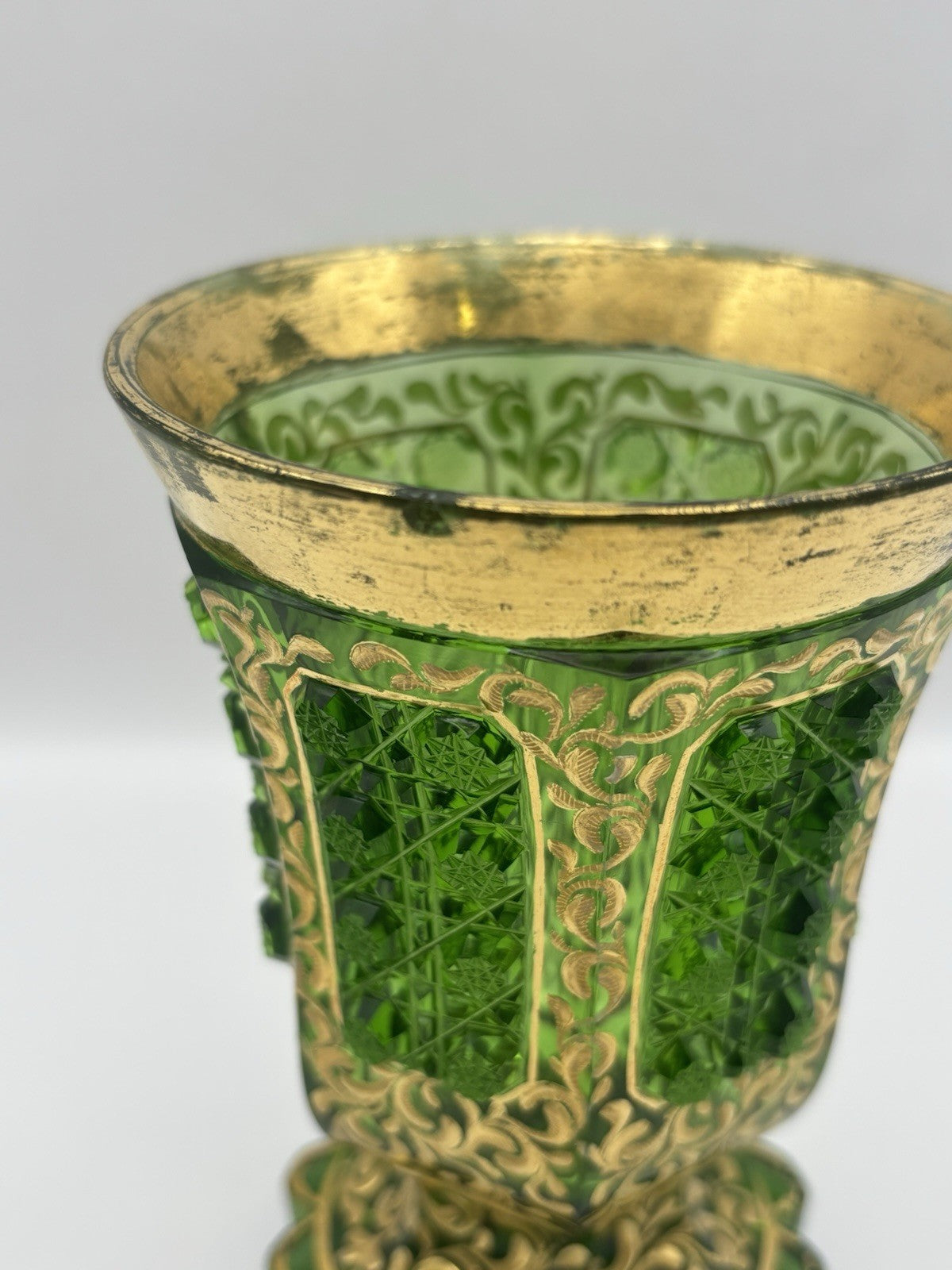 Bohemian Czech glass vase featuring hand-painted gold trim and panels 5.1”