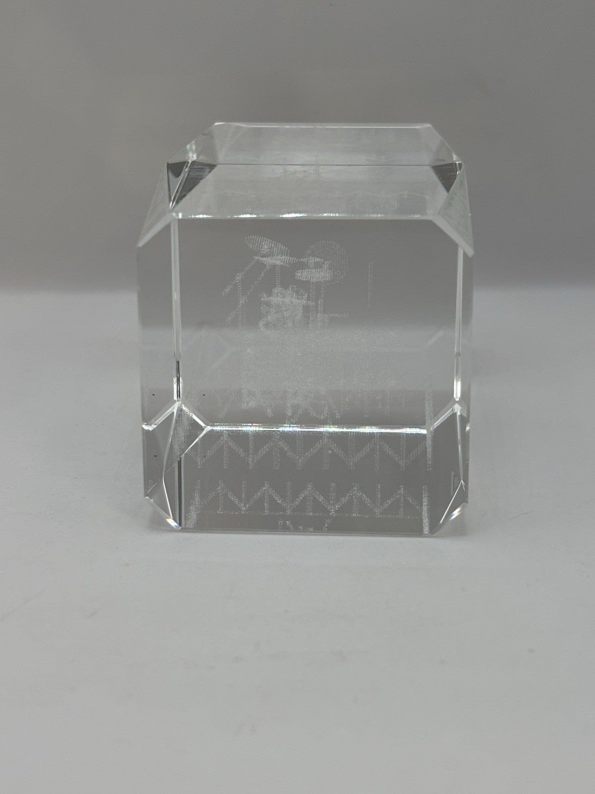 3D laser-etched crystal block paperweight featuring a drum set design