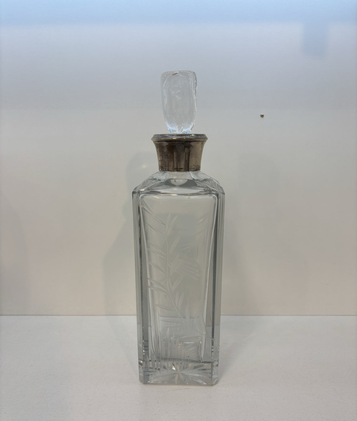 Magnificent cut crystal decanter w a sterlingsilver ram 10.7”