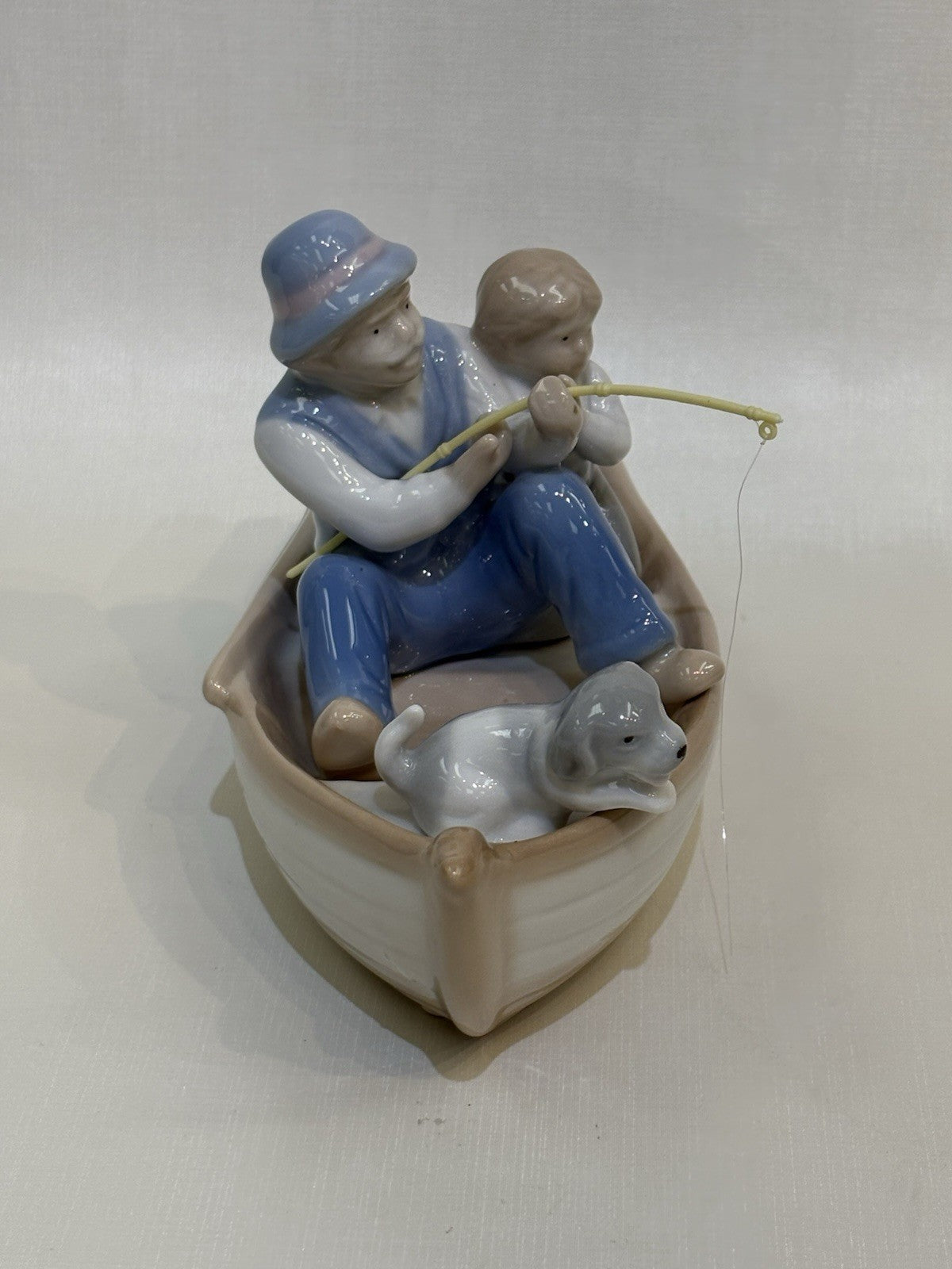 FISHING BOAT PORCELAIN FIGURINE MEICO GRANDPA GRANDSON DOG