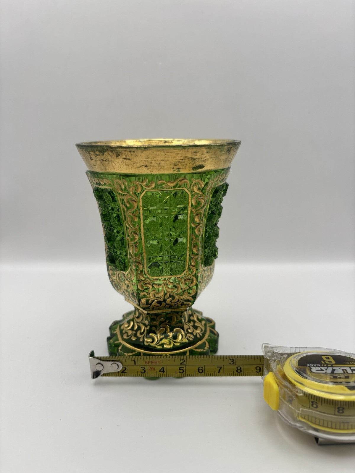 Bohemian Czech glass vase featuring hand-painted gold trim and panels 5.1”