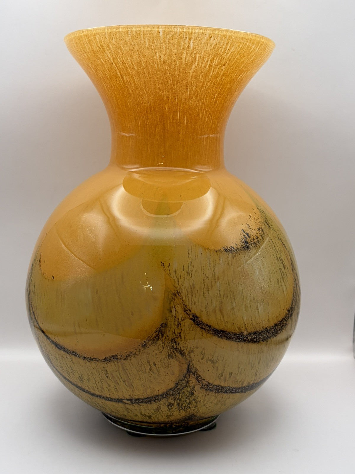Maestri Vetrai hand-blown art glass vase featuring a warm amber tone
