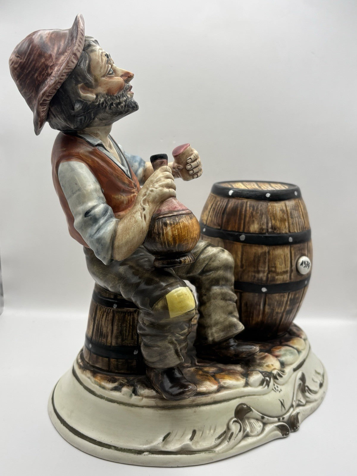 Vintage Capodimonte Hobo Tramp 10" Figurine Holding Jug W/Whiskey Barrels Italy