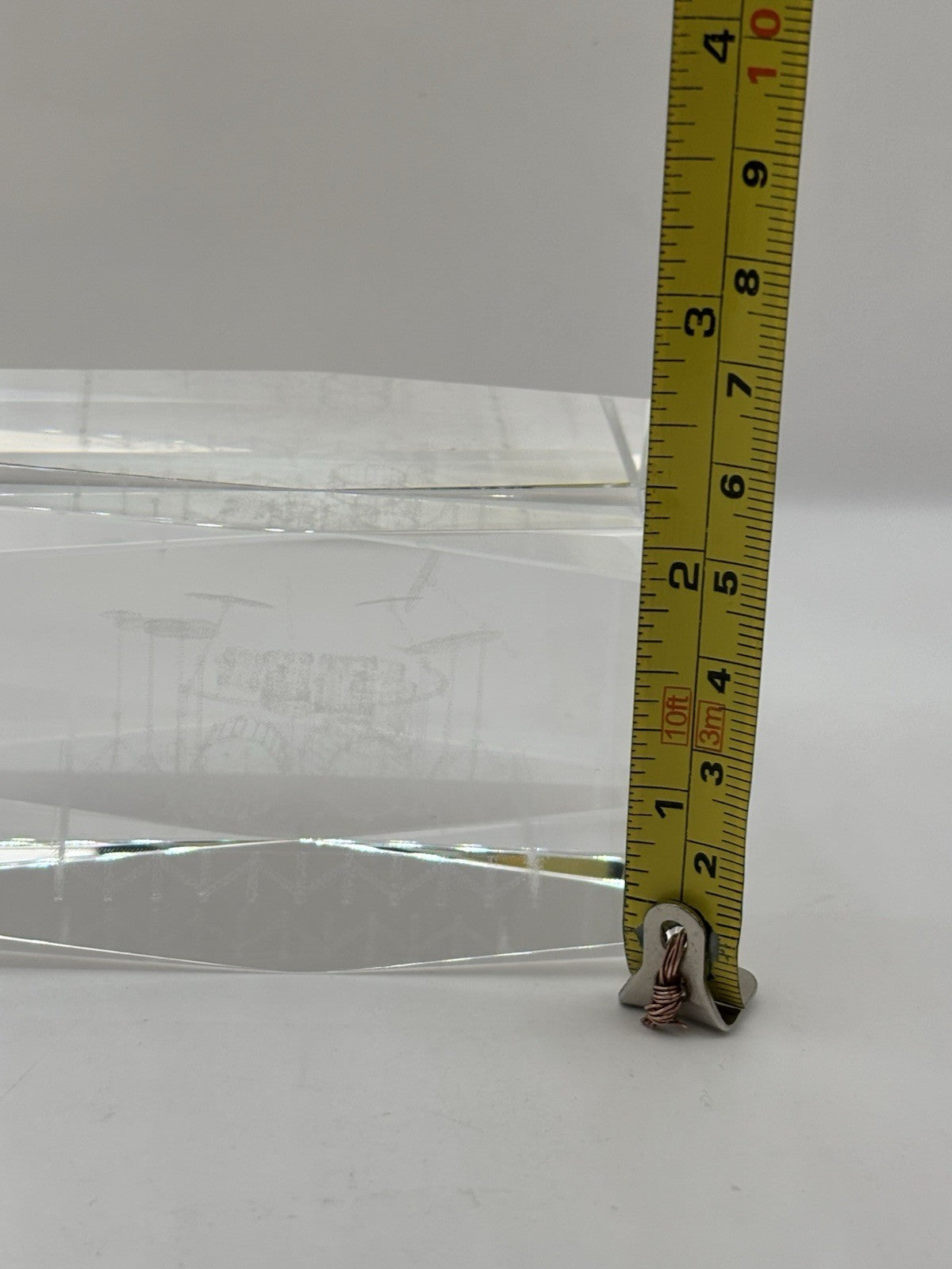 3D laser-etched crystal block paperweight featuring a drum set design
