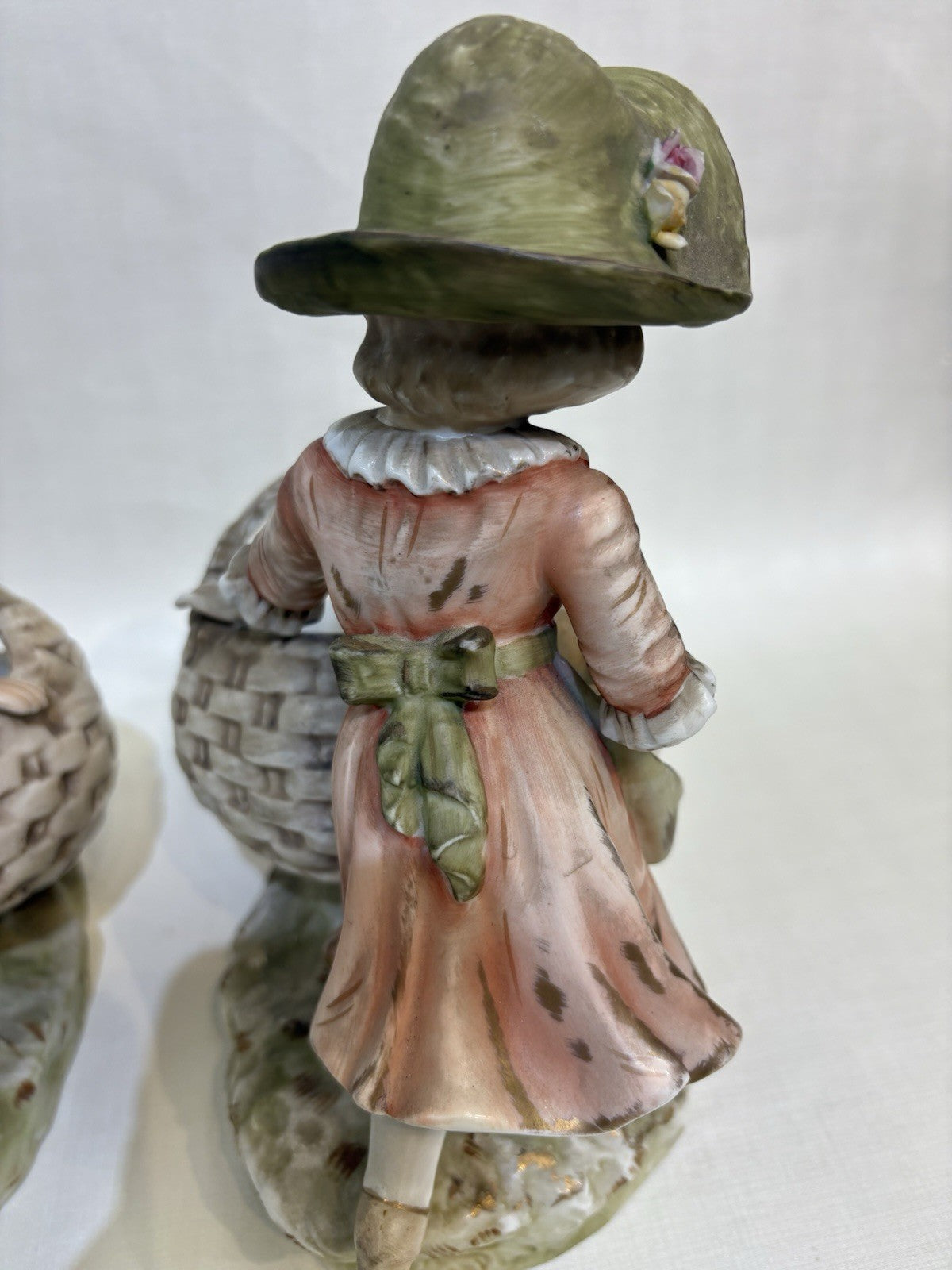 Pair Of Boy And Girl Porcelain Baskets Figurine
