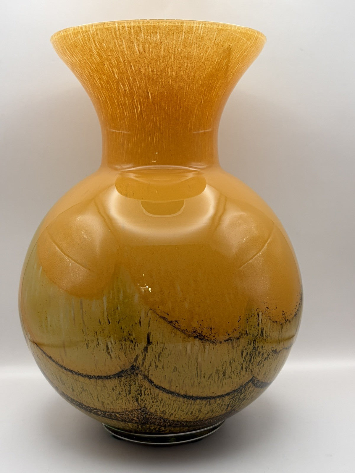 Maestri Vetrai hand-blown art glass vase featuring a warm amber tone