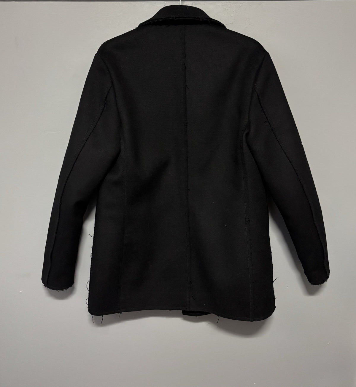 Black wool-blend double-breasted peacoat.  Tomás Maier Size 4