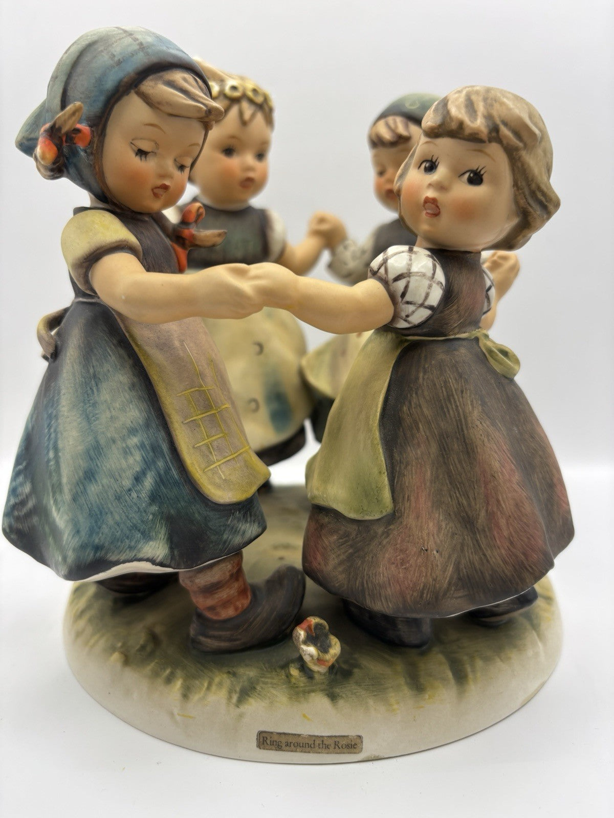 Goebel Hummel "Ring Around The Rosie" figurine, numbered 348