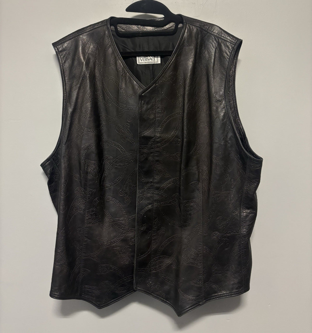Versace black leather vest with an embossed pattern. Size not know