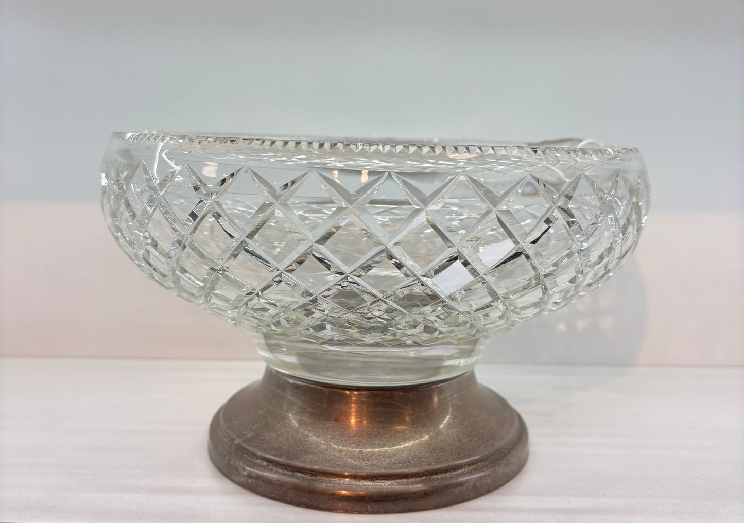 Crystal cut bowl with sterling base