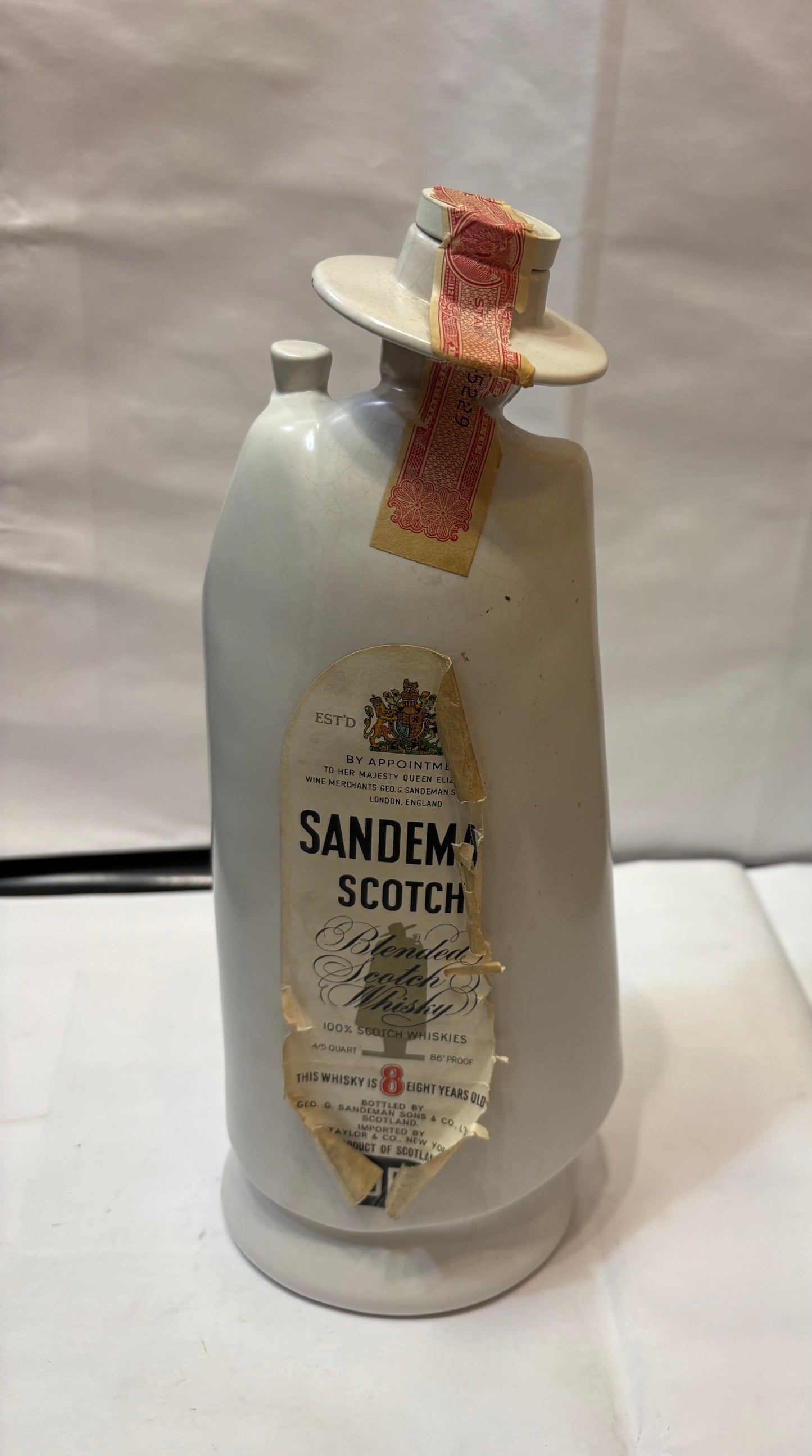 PAIR OF NV, Sandeman Blended Scotch Whisky, 8 Years Old, Scotland, 43%, early 1970s bottling,sealed in Barlaston of Etruria Moonstone Wedgwood.