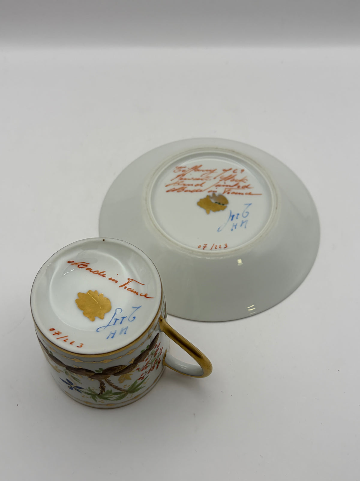 Tiffany & Co Porcelain Cup & Saucer Set, Painted Floral/Bird, White Gold Trim Handle