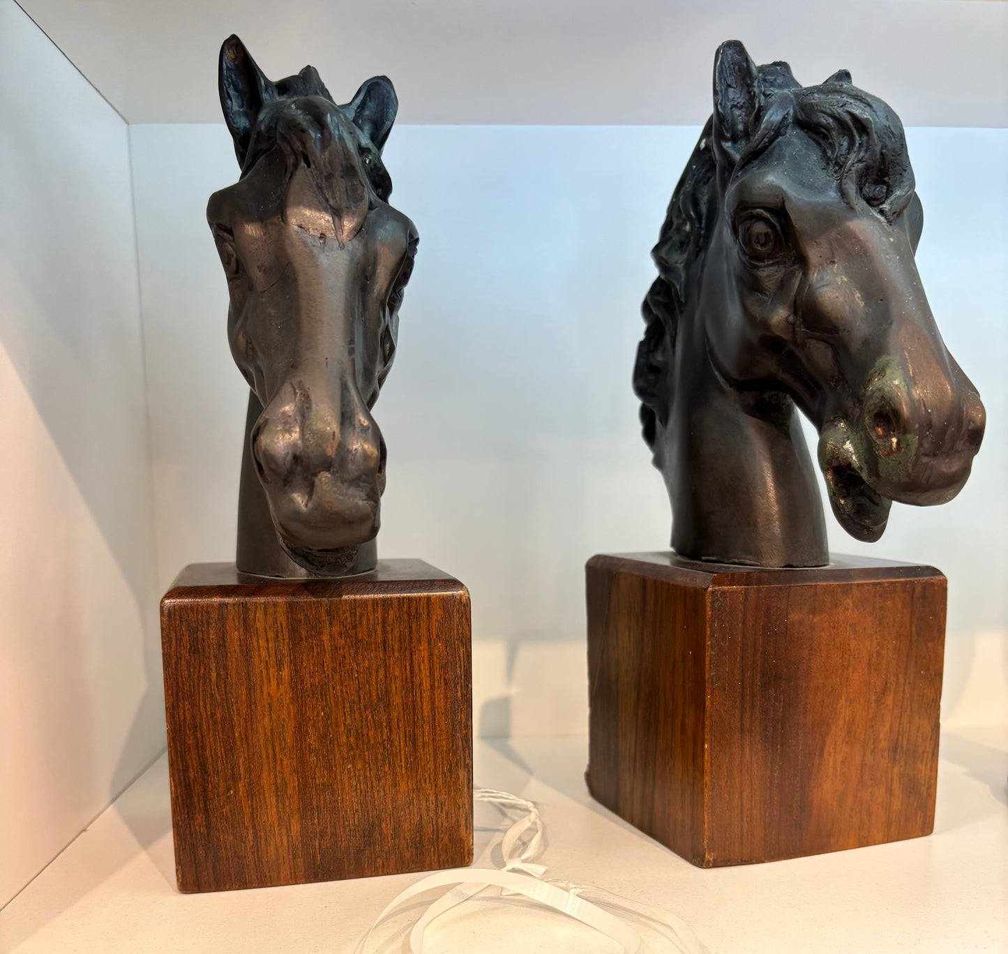 Early 20th century horse head bronze sculpture with wood.